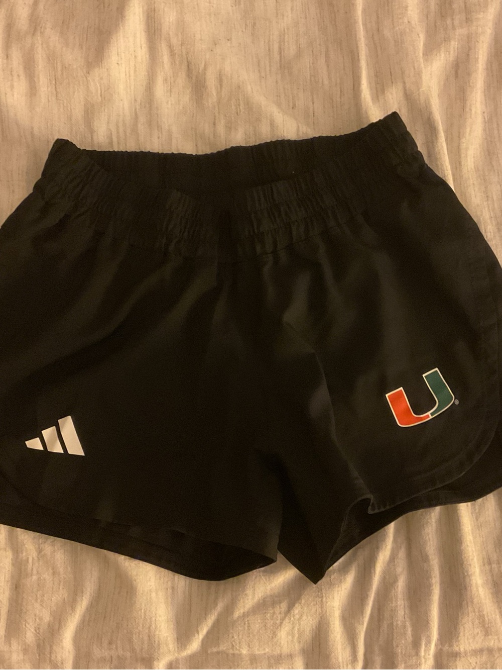 adidas Black Athletic Shorts with Orange & Green University 'U' Logo